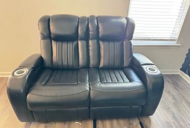 Black Leather Reclining Loveseat with Cup Holders