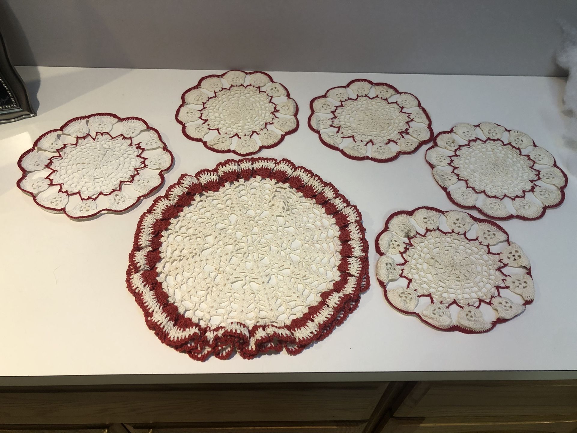 Hand Crochet Doilies. I Large -12”, 4 Medium - 8”.