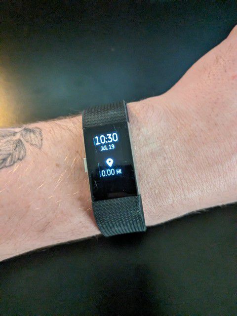 Black Fitbit With Charger