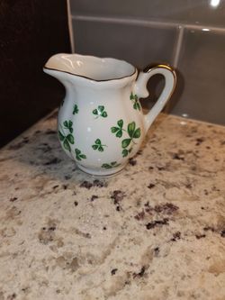 Letton white with clover print pitcher with gold trim.