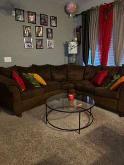 It’s Brown suede sectional. I had it for like four years. It’s still in good condition.