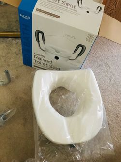 Raised toilet seat