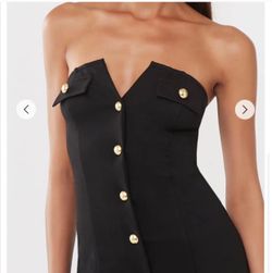 Black sleeveless dress with gold button detail