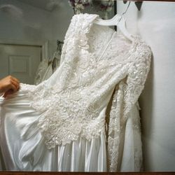 White Lace And Sequined Wedding Gown With 20 Foot Long Train