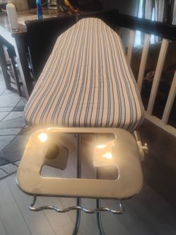 Deluxe ironing Board with. Iron rest and hooks