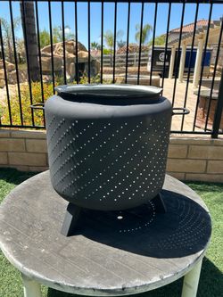 SUMMER SPECIAL!!!  Fire pit made from washing machine tub with legs and handles.   Dryer drum versions also available.