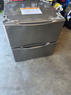 Washer and dryer  pedestals  LG gray