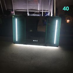 Bathroom mirror with led lights, timer, and defroster