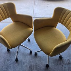2 beautiful yellow decorative chairs