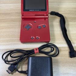 Red Gameboy Advanced SP.                      O78