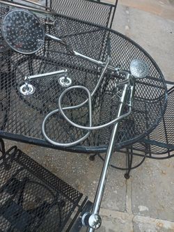 Used Shower Head  and Toilet Paper Holder