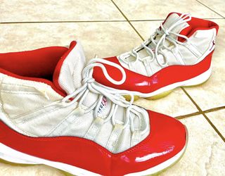 Air Jordan 11s, cherry red, size 10