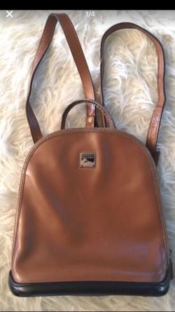 Vintage parasole camel brown Dooney and Bourke leather backpack shows signs of minor wear still in great condition 10"X3.5"X11"