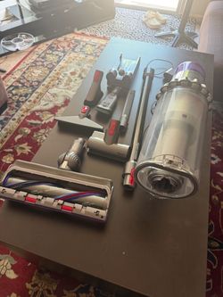 Dyson outsize vacuum with 6 heads