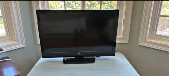 JVC Flat Screen TV with Stand