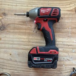 Milwaukee M18 Drill 1/4 Hex Impact Driver With Red Lithium XC5Battery