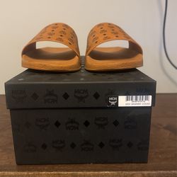 I’m selling my mcm slides with original box and bag also and Receipts mcm slides authentic with receipt box size 11 for Sale in  main image 2