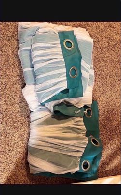 Curtains size 84” like new. $35