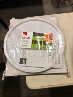 Metal round table new in plastic