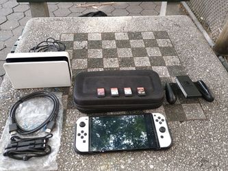 Used OLED Switch with 4 games for $300