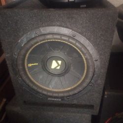 Two Kicker 10s In Separate Boxes With A 400 Watt Amp