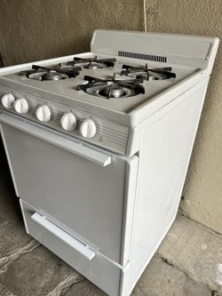 24" small medium  gas stove .Electric ignition. 