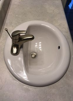 Lavatory with faucet new the pictures is a sample