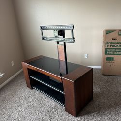 Tv Stand , Great Condition, Rotates , Storage Siding 