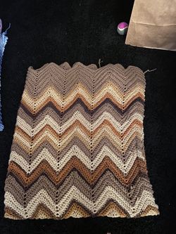 Hand knitted throw blankets