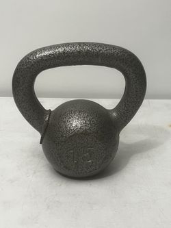 15 Lb. Cast Iron Kettlebell gray. Location  31705 Wesley Chapel blvd Fl 33543 Storage Mart   