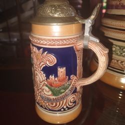 Set Of Four German Steins