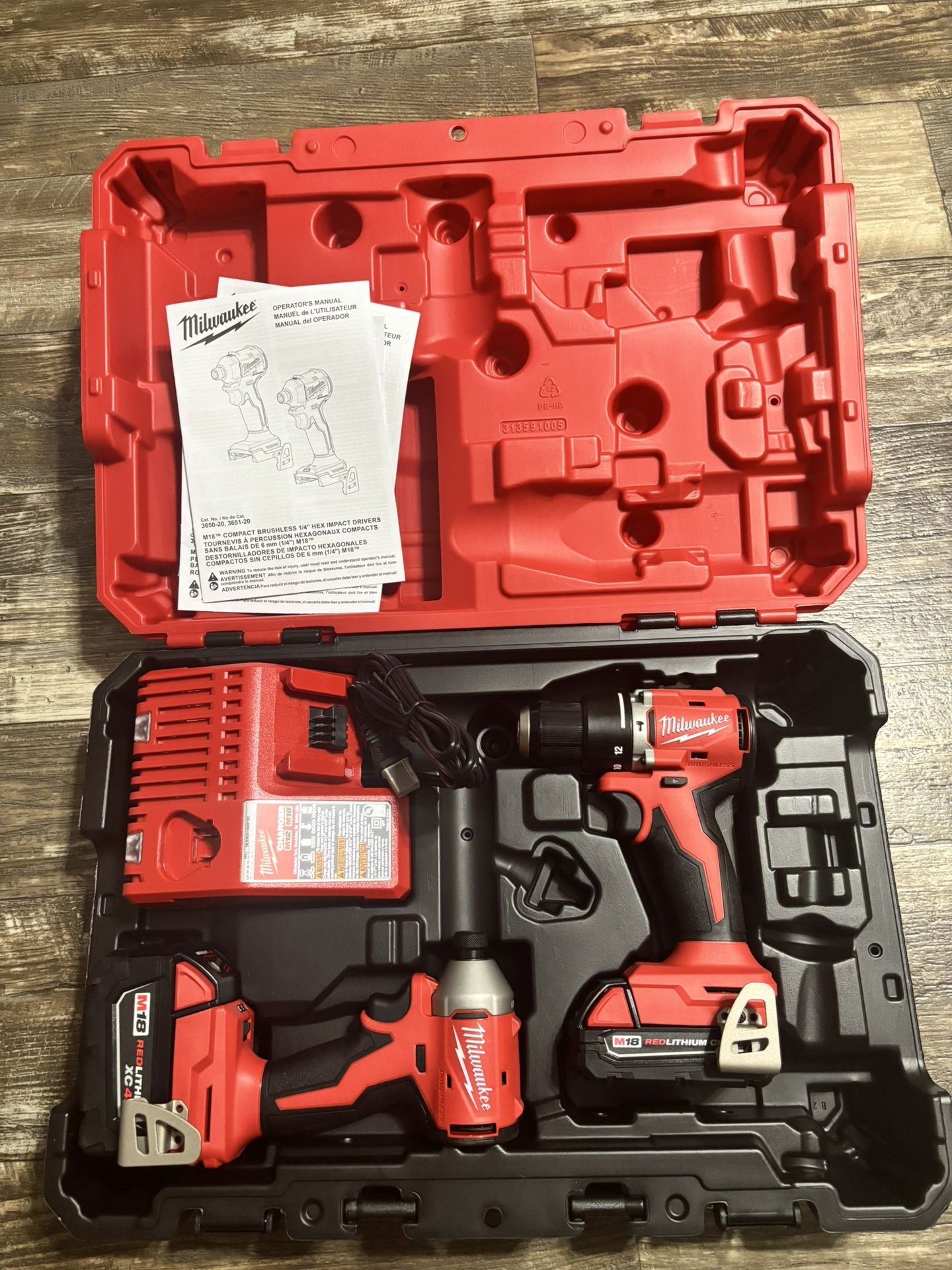 Milwaukee M18 Brushless Cordless Compact 1/2 Hammer Drill/ 1/4 Impact 3 Speed Combo Kit