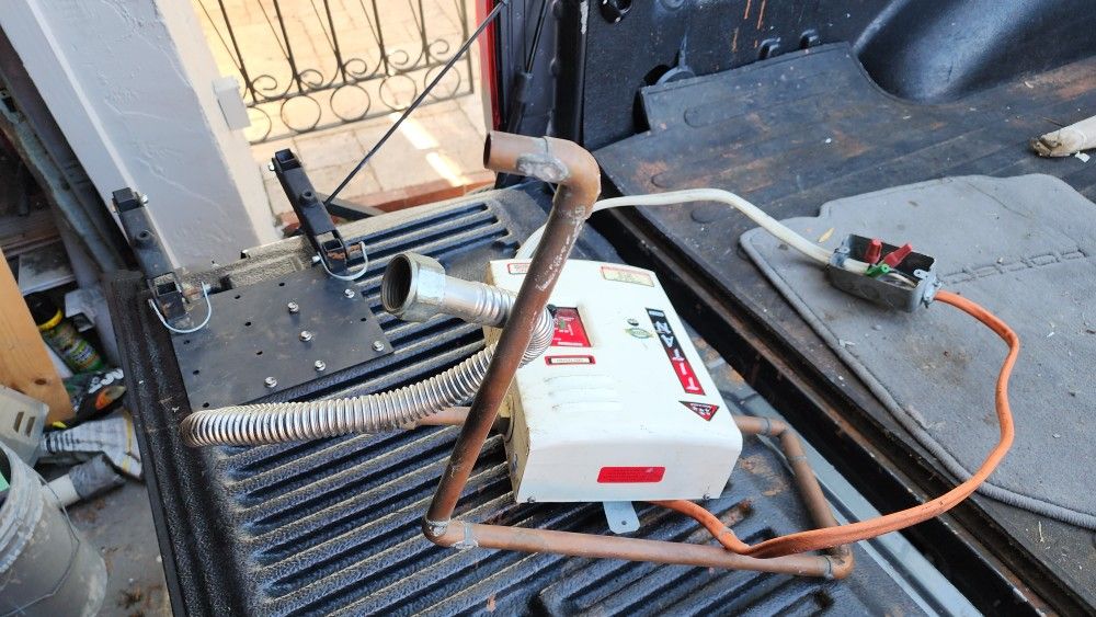 Tankless Water Heater Titan for Sale in Hialeah, FL - OfferUp