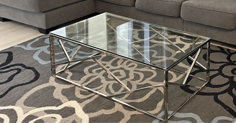 Glass coffee table and rug