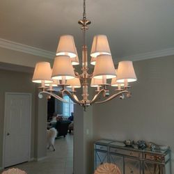 New, In Original Box.  Chandelier with glass center