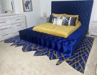 Navy Bed frame With Custom Hand knotted Rug