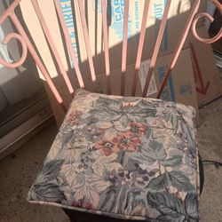 Iron Chair And Pillows