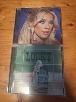 Two Megan Moroney CDs - Am I okay? & Lucky