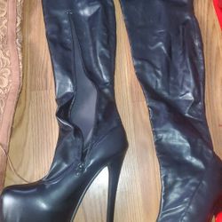 Multiple Pairs Of Thigh High Boots