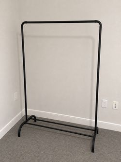 Freestanding Clothing Rack – $25