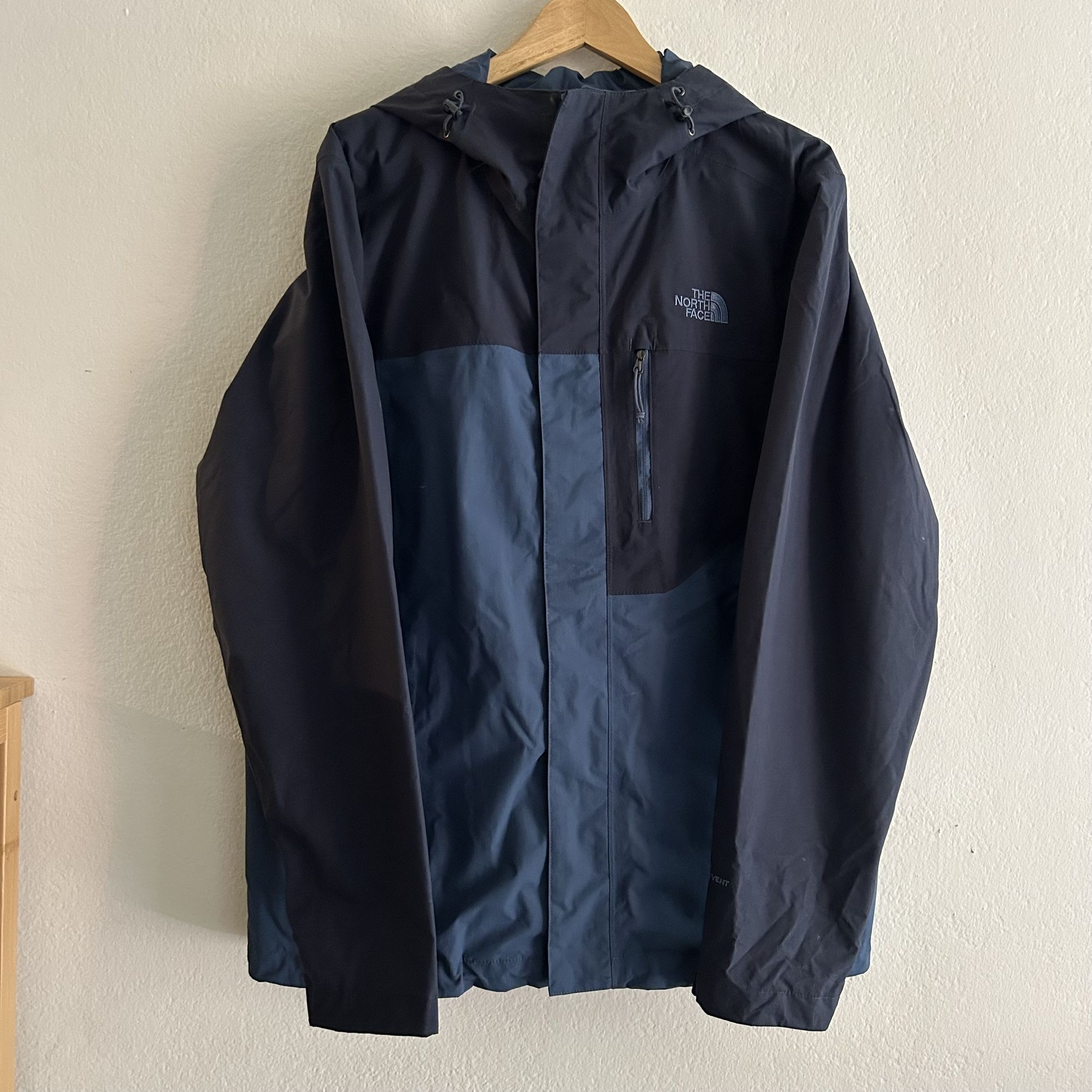 The North Face Dryvent Size M. waterproof jacket in blue and navy