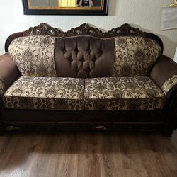 big and small brown two couch set