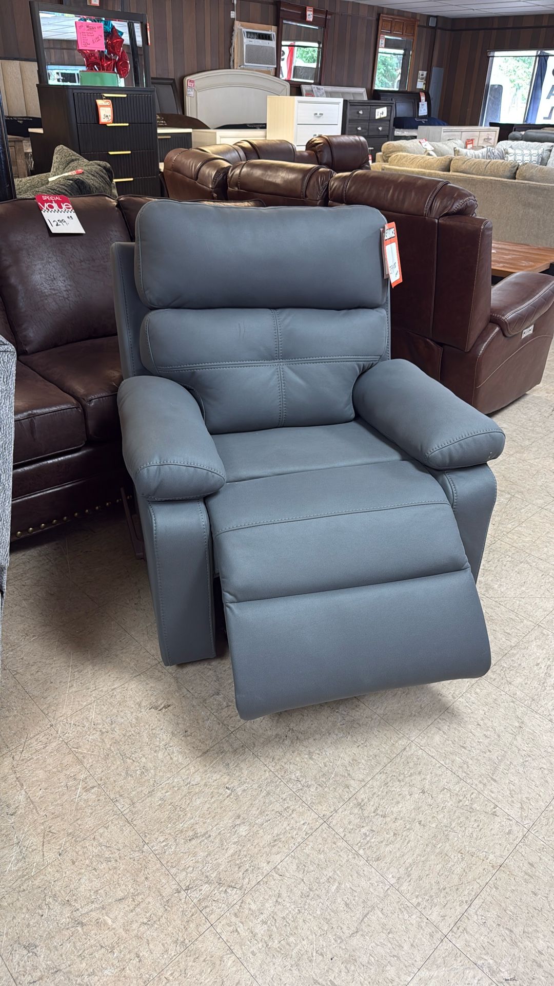 Brand new recliner comes in beige comes in gray for 399 hurry before the tariffs kick in