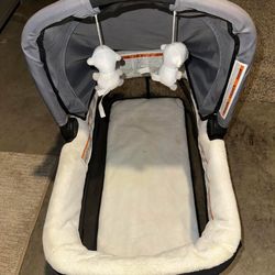 Rocking Bassinet With Hanging Toys