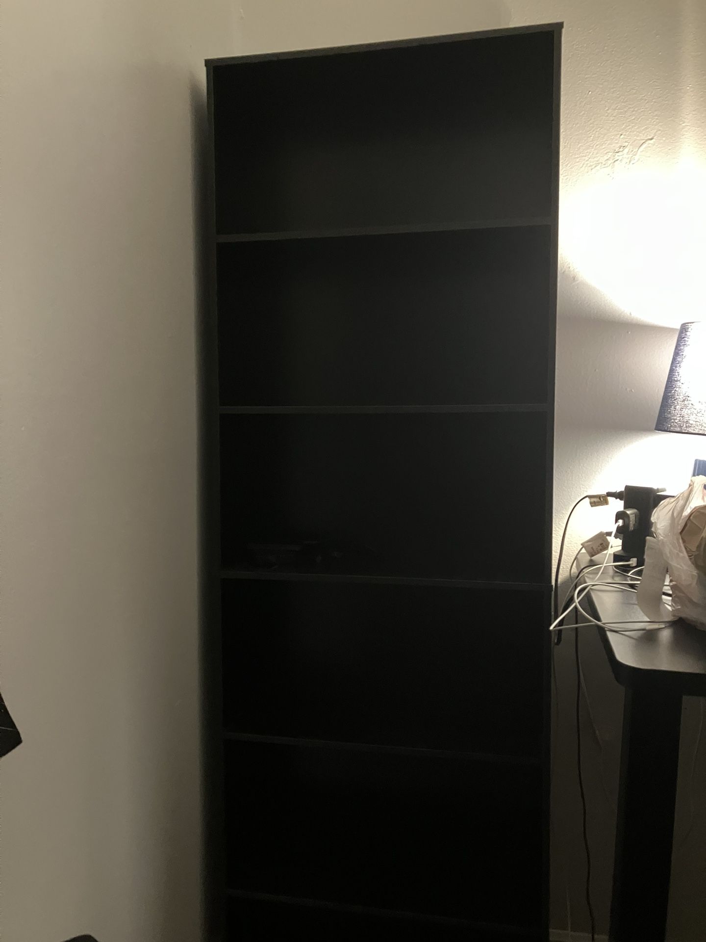 Four six-shelf bookshelves