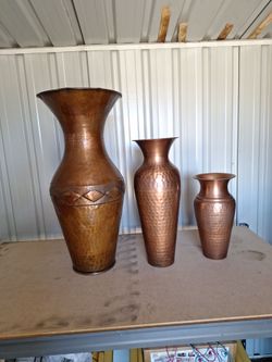Hammered vintage copper floor vases