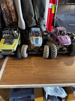 RC cars 1- Axial Deadbolt and 2 Danchee Ridge Rock