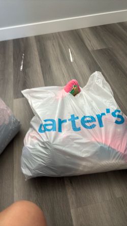 A bag of curl clothes from age 7 to 8 a lot of options