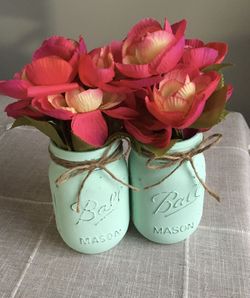 Distressed mason jar vases with silk flowers included! $10 for both
