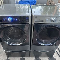 Accela-Wash • Steam  & Kenmore Connect • Vibration Guard—Kenmore Elite Made By (LG) washer and Electric Dryer on pedestals, 